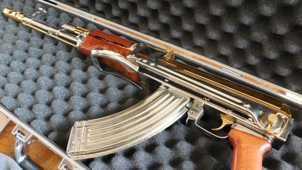 Three men arrested for taking target practice at school with a gold plated AK-47